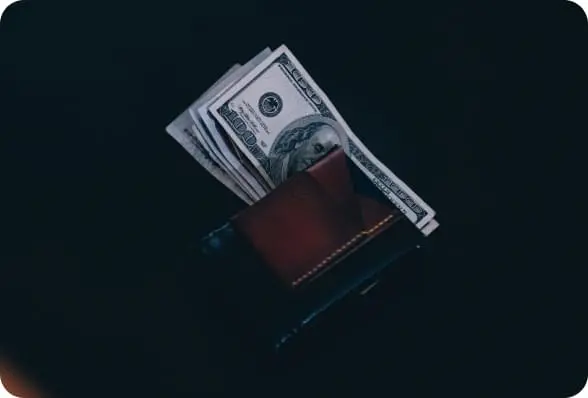 Immediate Profit digital trading concept with cash in a wallet